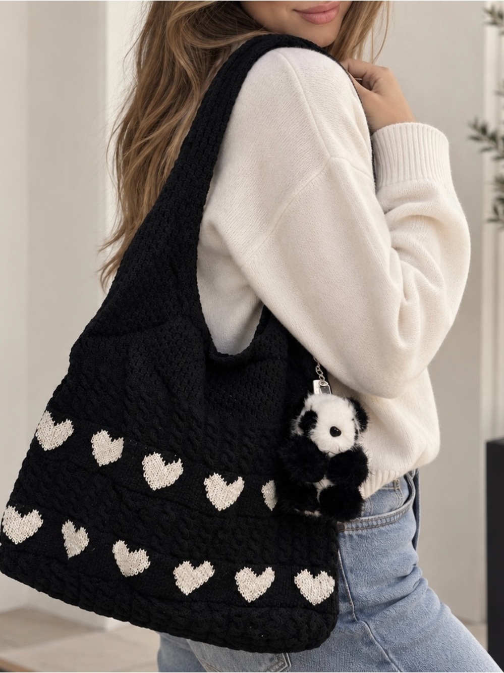 Black Knit Shoulder Bag with Ivory Heart Accents and Plush Keychain